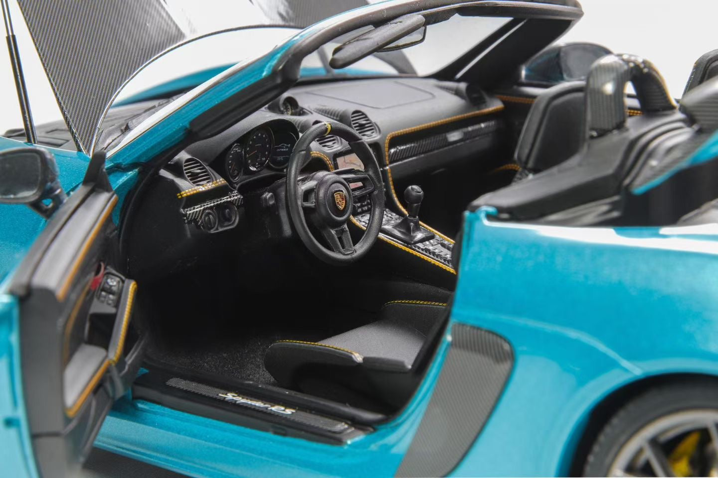 The Minichamps 1/18 Porsche 718 Sypder RS in Ipanema Blue is now available! Featuring numerous improvements over the standard model, the custom model comes in a gift box and is limited to just 300 units.